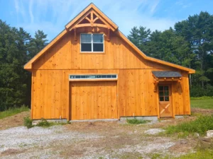 Barn garage front showing natural stain color